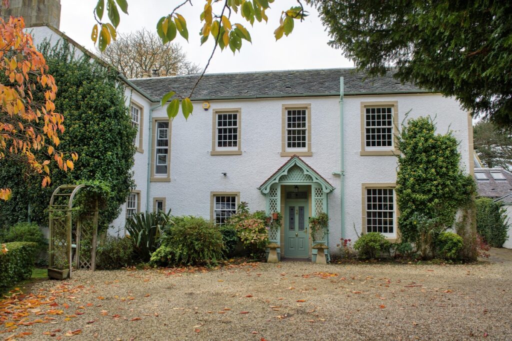 Bygone sash window with traditional glazing bars for listed building renovations