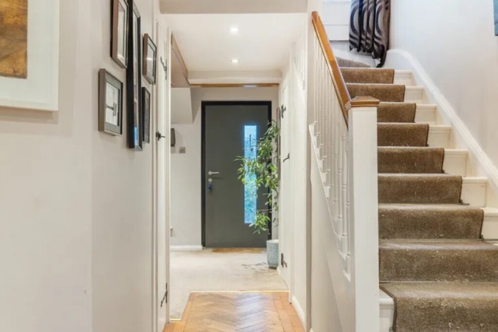 Aluminium entrance door and picture window on the front elevation of a Chilterns property