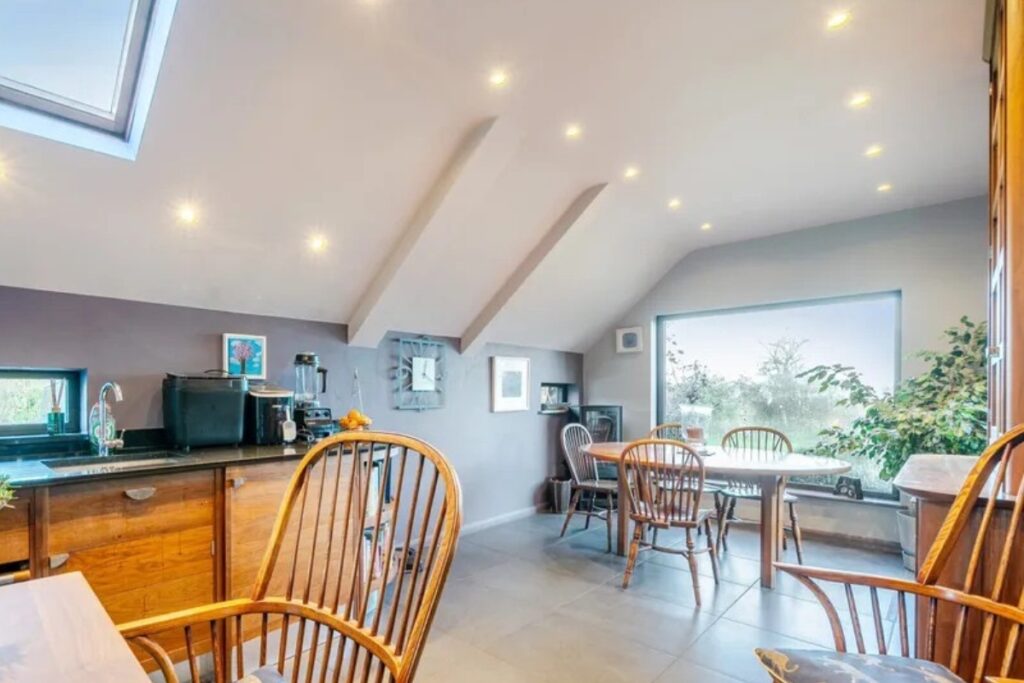 Vaulted kitchen with rooflight and large picture window in a Chilterns property